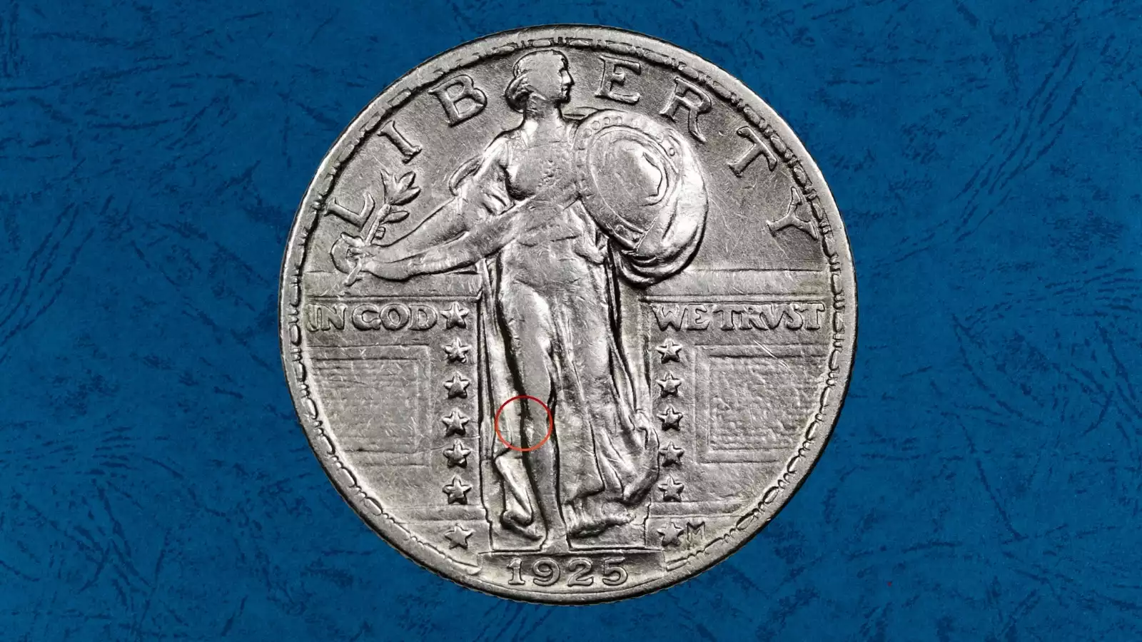 1925 quarter die clash error showing ghost 'E' impression from reverse lettering on the obverse near Liberty's knee